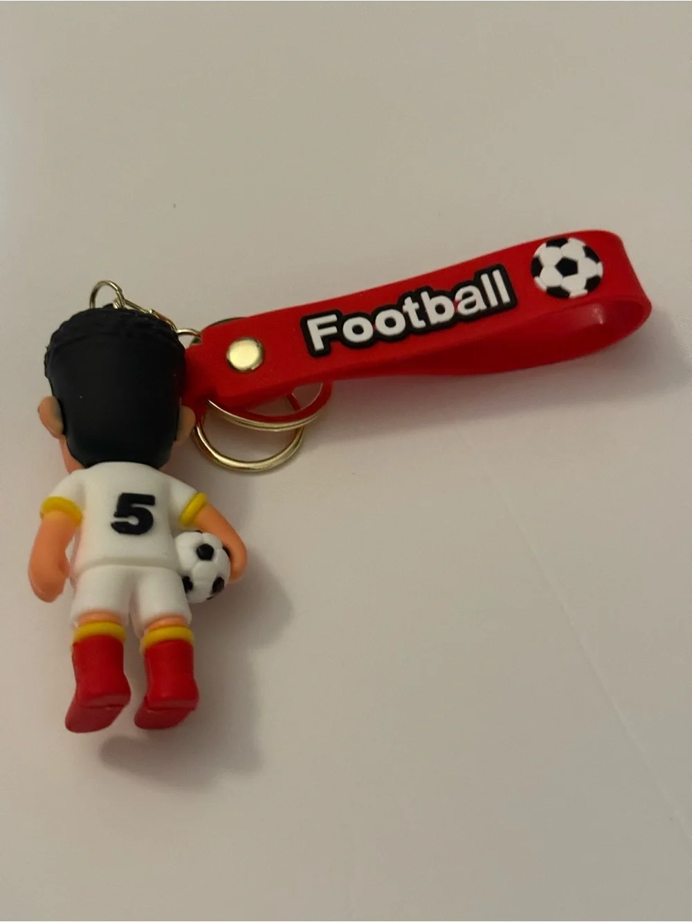 Football Red Keychain with White Soccer Player Figure